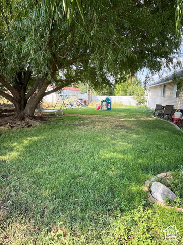 2548 South 700 West Perry, UT 84302 - Photo 15 of 18 View of yard featuring a playground