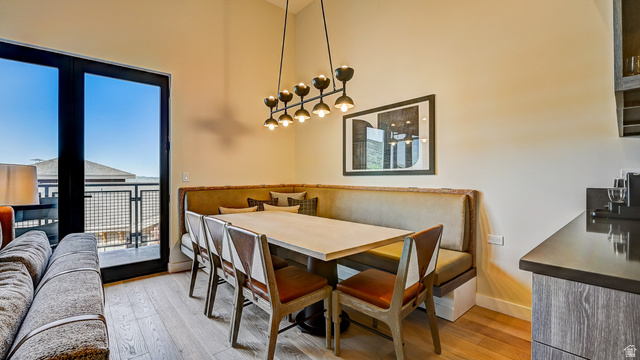 2417 West High Road, Unit 2515 Park City, UT 84098 - Photo 10 of 67 Dining area featuring light wood finished floors and baseboards