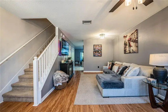 a kitchen with a sink stainless steel appliances and cabinets