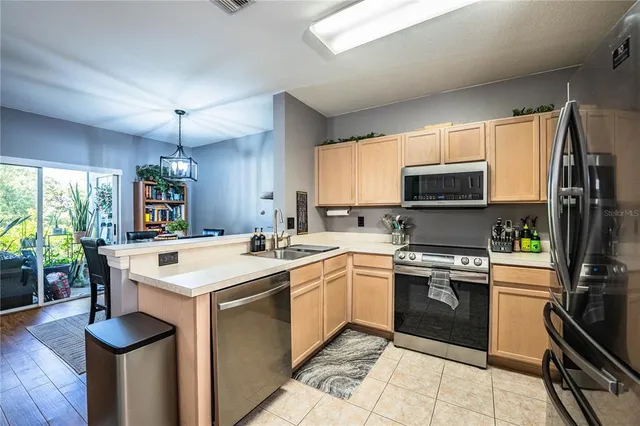 a bathroom with a sink a mirror and a toilet