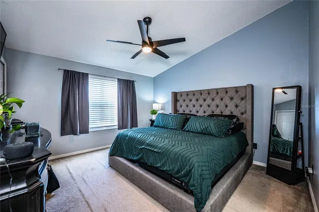 a bathroom with a sink toilet and mirror