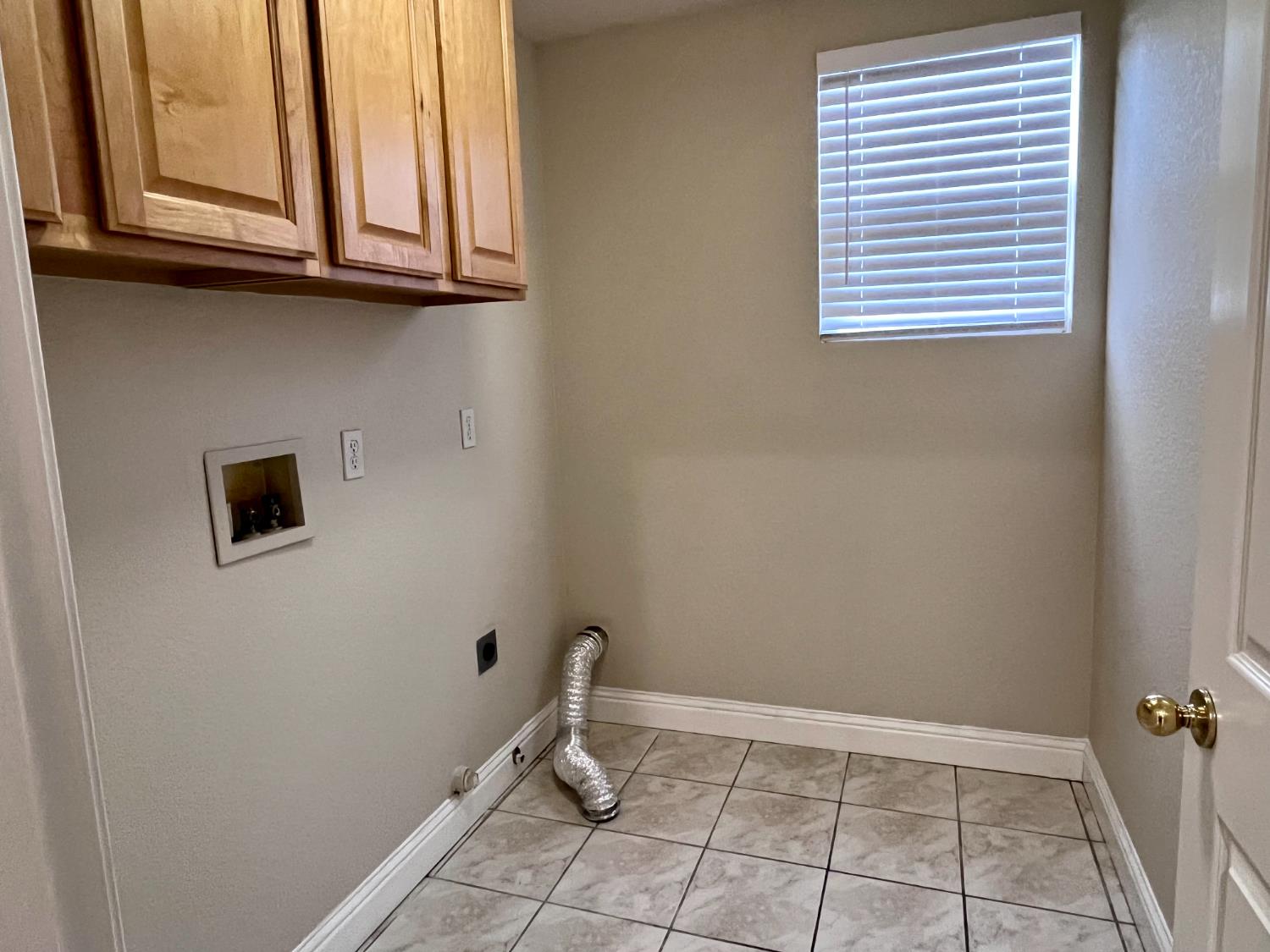 13310 Parkhaven Street Lathrop, CA 95330 - Photo 11 of 27 a view of an empty room with a window