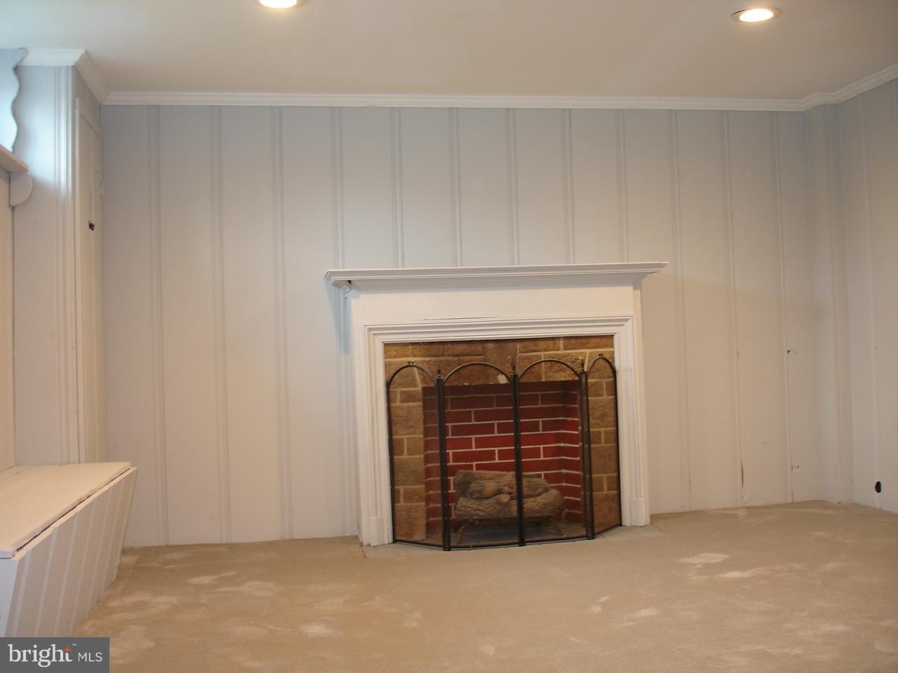 1013 Witherspoon Road Baltimore, MD 21212 - Photo 11 of 29 Finished Lower Level with Decorative Fireplace