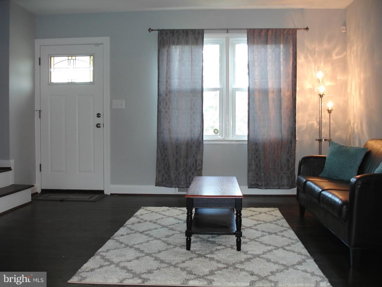 1013 Witherspoon Road Baltimore, MD 21212 - Photo 3 of 29 Spacious Living Room - Gorgeous Hardwood Floors