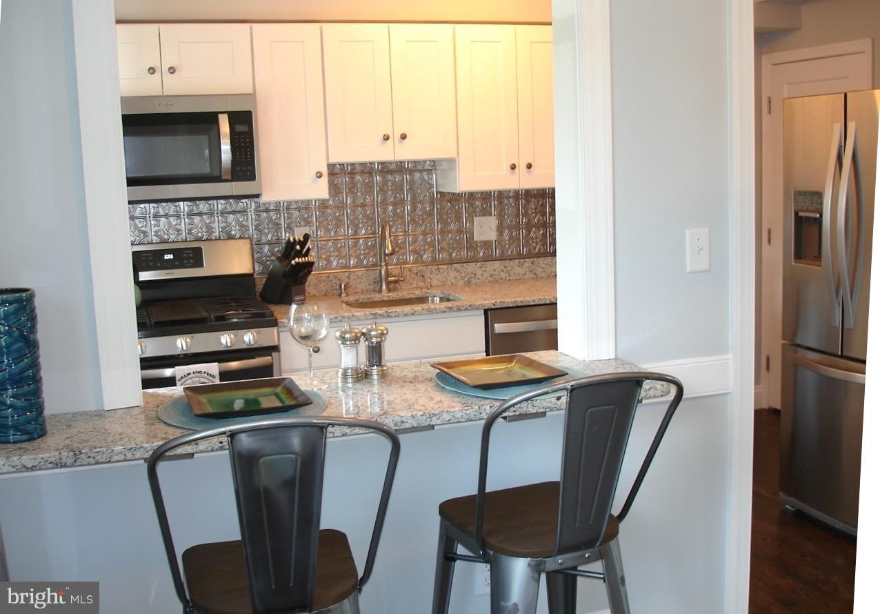 1013 Witherspoon Road Baltimore, MD 21212 - Photo 7 of 29 All NEW Kitchen with Eat- At Breakfast Bar