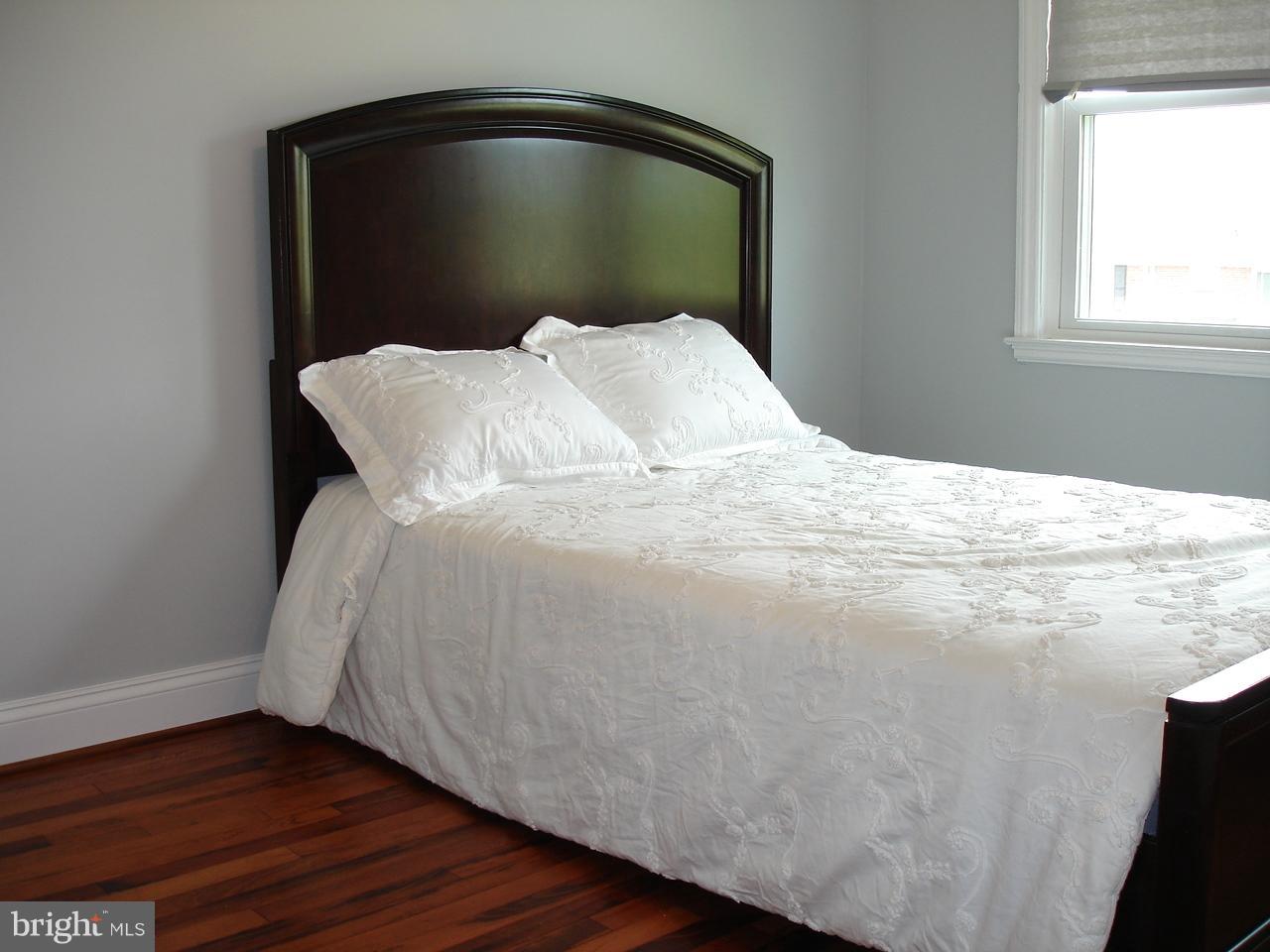1013 Witherspoon Road Baltimore, MD 21212 - Photo 8 of 29 Large 1st Bedroom - Gorgeous Hardwood Floors