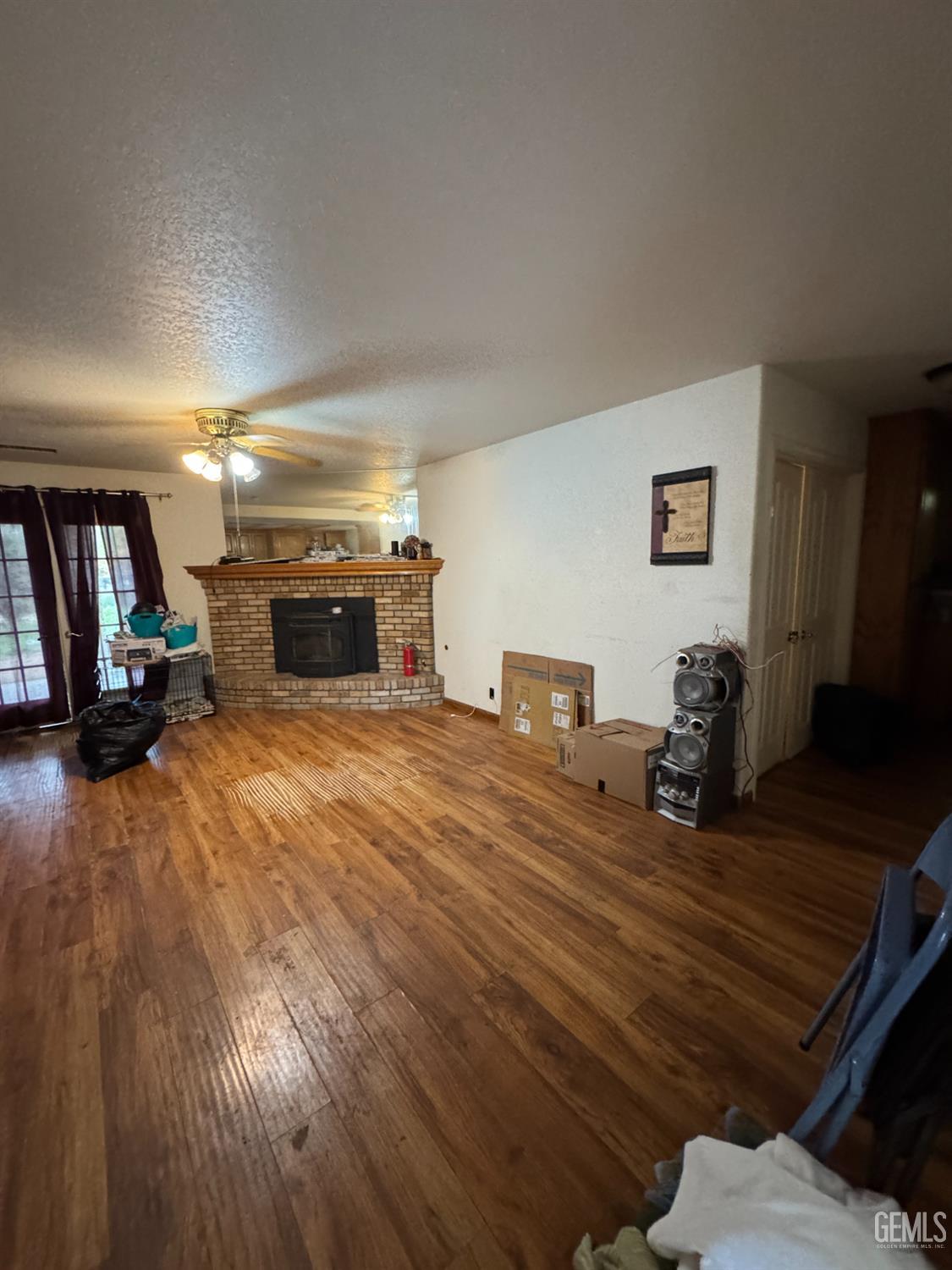 Undisclosed Address Tehachapi, CA 93561 - Photo 6 of 11 a bedroom with furniture and a flat screen tv