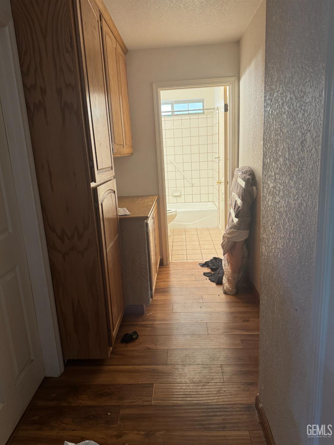 Undisclosed Address Tehachapi, CA 93561 - Photo 7 of 11 a view of a room with wooden floor and chair