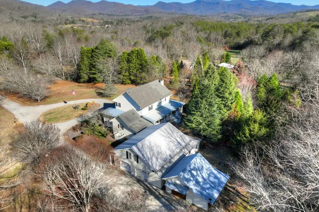 a view of a balcony with floor to ceiling windows yard