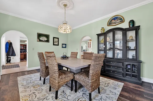 a bathroom with a sink toilet and a mirror
