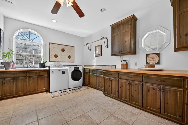 a view of a swimming pool with a yard