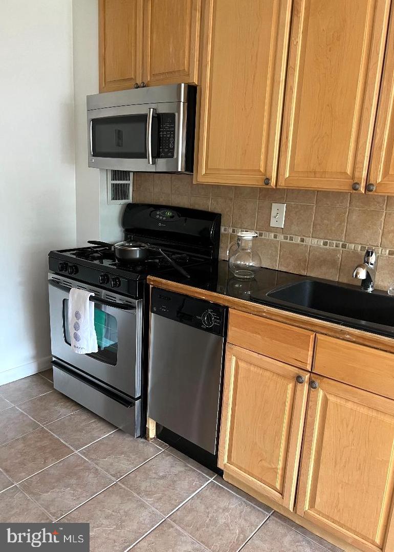 8601 Manchester Road, Unit 321 Silver Spring, MD 20901 - Photo 8 of 18 Second view of the kitchen