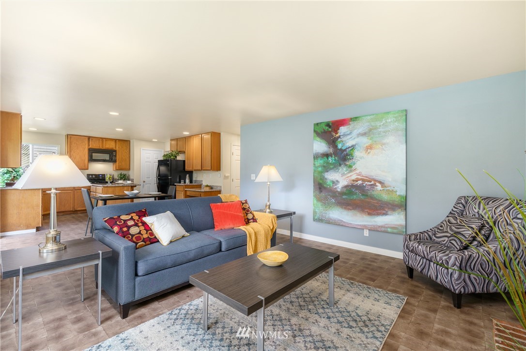 19104 113th Way Southeast Renton, WA 98055 - Photo 11 of 30 a living room with furniture and a couch