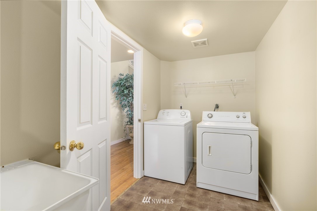19104 113th Way Southeast Renton, WA 98055 - Photo 17 of 30 a view of storage room with washer and dryer