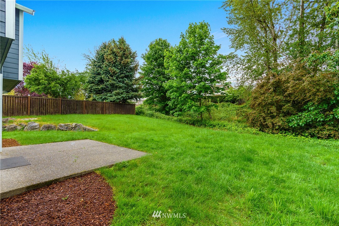 19104 113th Way Southeast Renton, WA 98055 - Photo 22 of 30 a view of a backyard with a garden