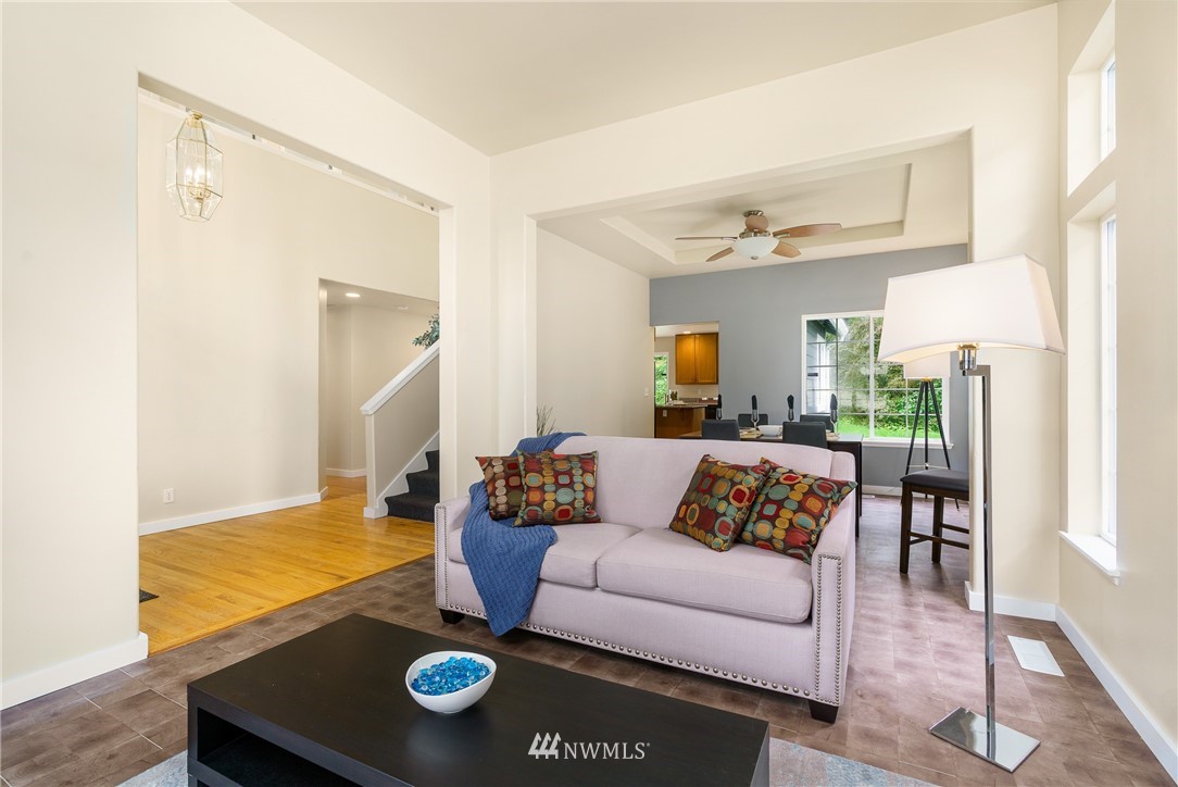 19104 113th Way Southeast Renton, WA 98055 - Photo 4 of 30 a living room with furniture and a table
