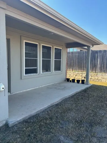 a view of an empty room with a ocean view