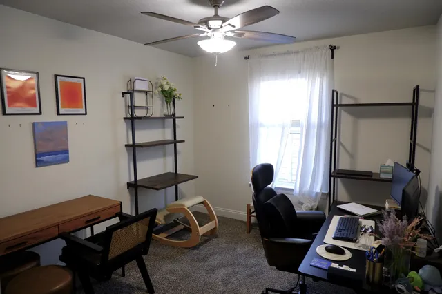 a room with furniture and wooden floor