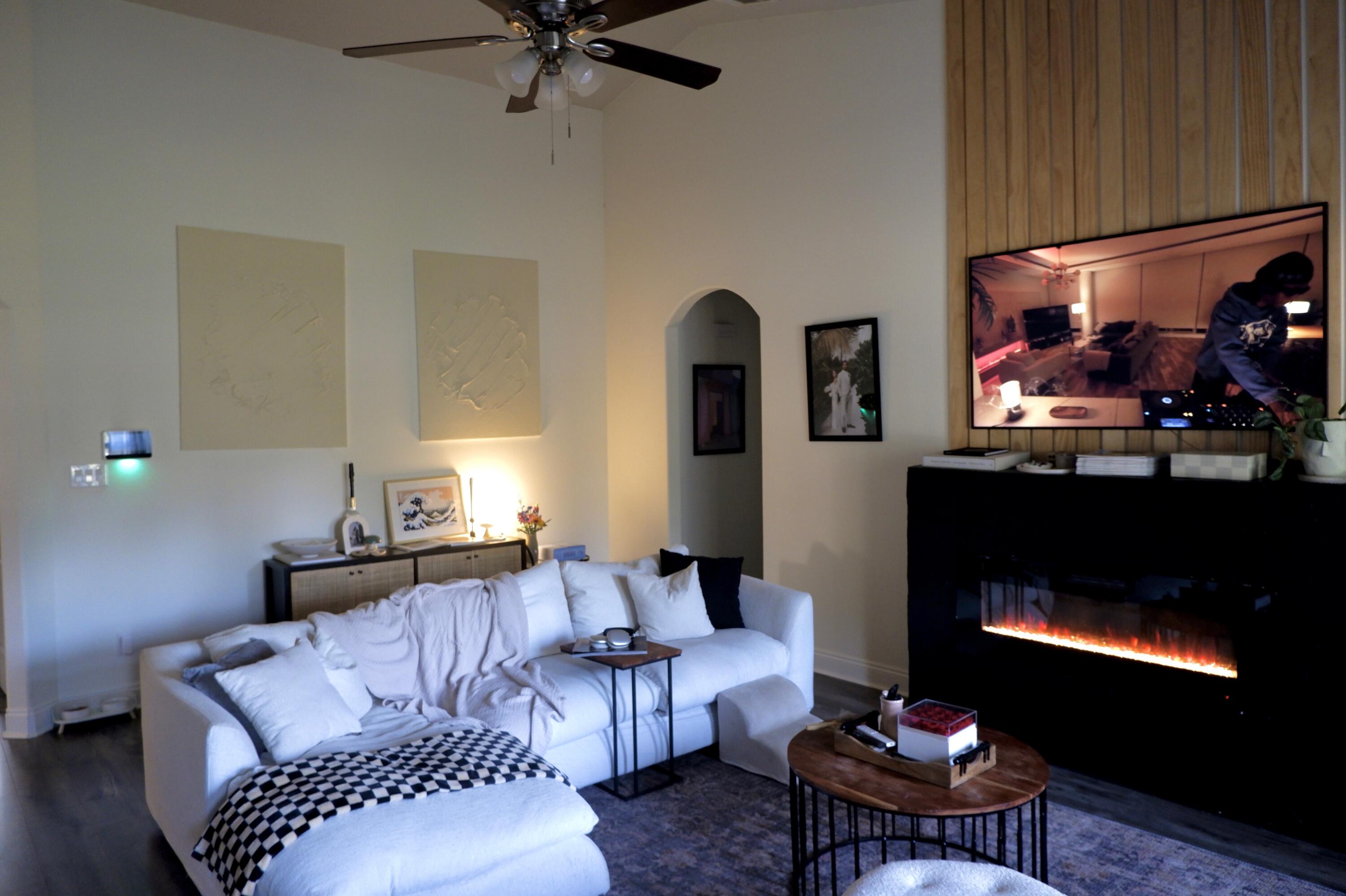6841 Nelson Street Navarre, FL 32566 - Photo 6 of 14 a living room with furniture and a fireplace