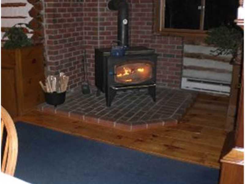 311 Cottrell Road Dixmont, ME 04932 - Photo 14 of 31 Other. Showing main woodstove and...