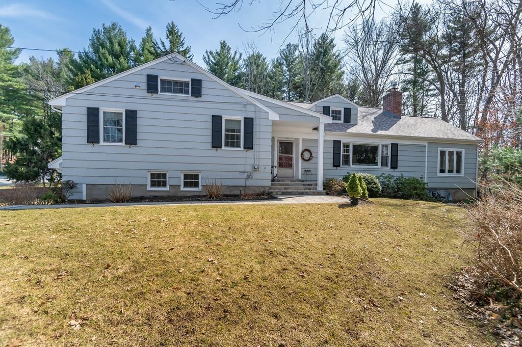 15 Arcadia Road Andover, MA 01810 - Photo 1 of 42 a front view of a house with a yard