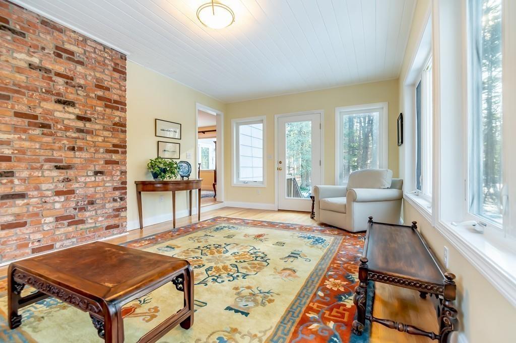 15 Arcadia Road Andover, MA 01810 - Photo 17 of 42 a living room with furniture rug and a table