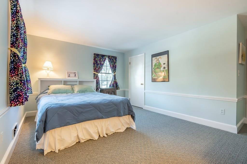 15 Arcadia Road Andover, MA 01810 - Photo 29 of 42 a bedroom with a bed and a night stand