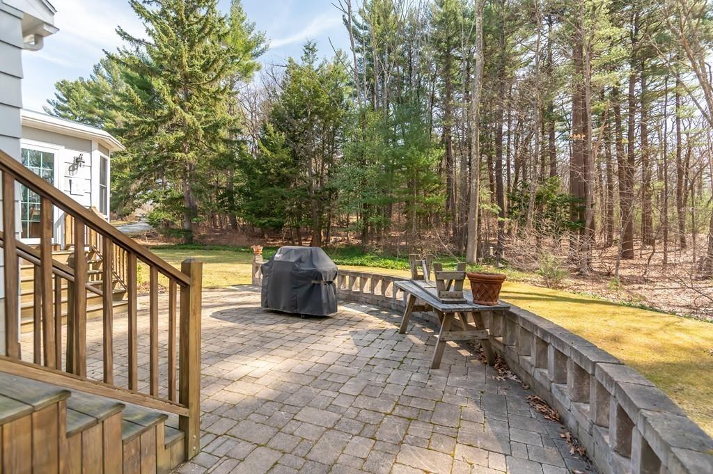 15 Arcadia Road Andover, MA 01810 - Photo 36 of 42 a view of a swimming pool with a lounge chairs