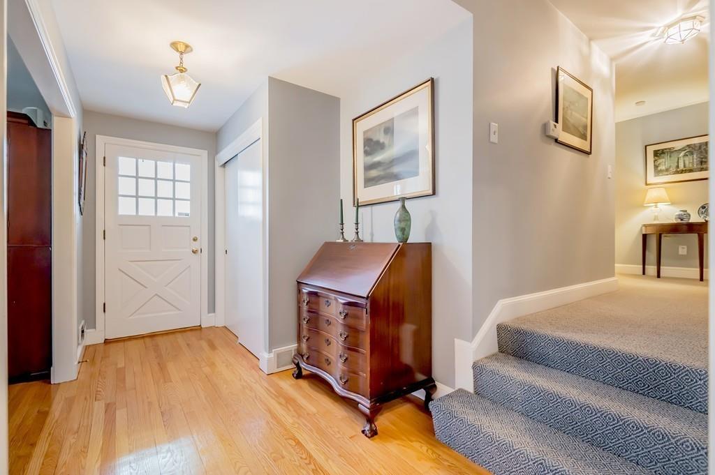 15 Arcadia Road Andover, MA 01810 - Photo 4 of 42 a bedroom with a bed and wooden floor