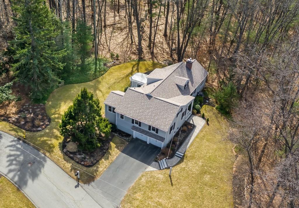 15 Arcadia Road Andover, MA 01810 - Photo 42 of 42 an aerial view of a house with swimming pool and large trees