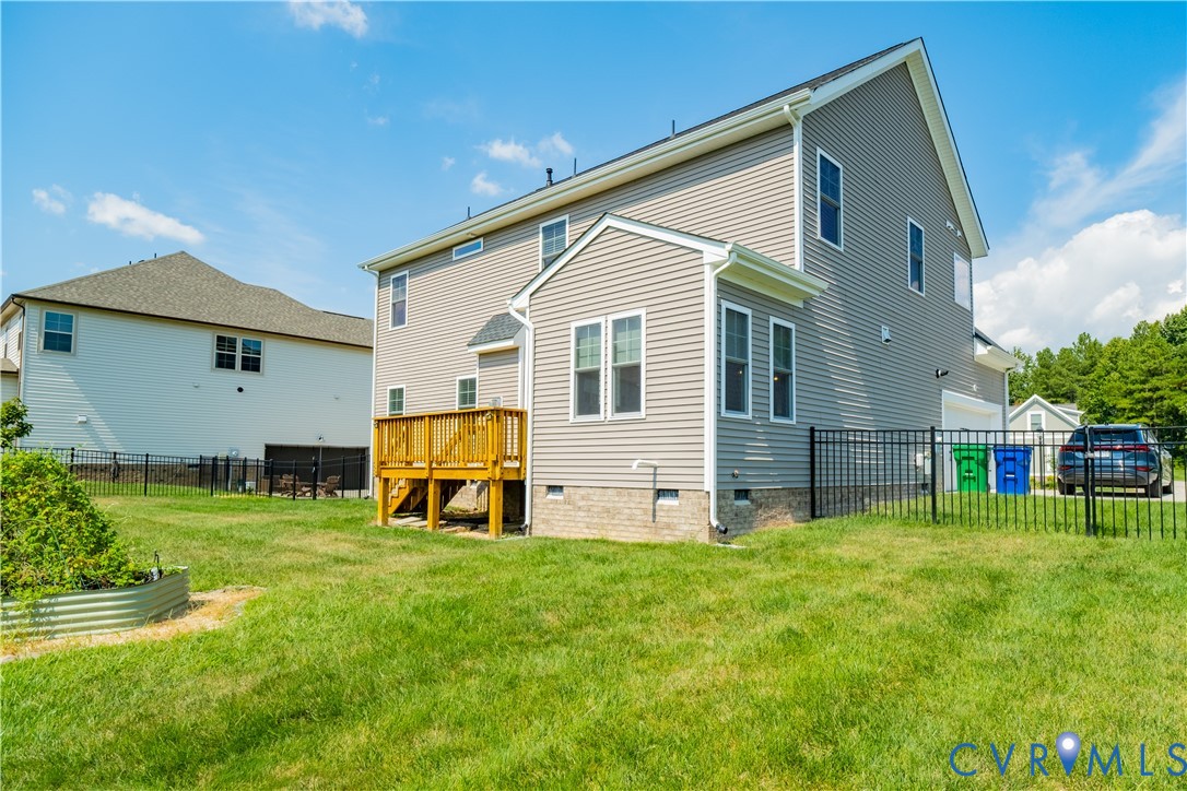 15607 Crowden Road Chesterfield, VA 23832 - Photo 54 of 57 Rear exterior with a wooden deck, gray siding, and