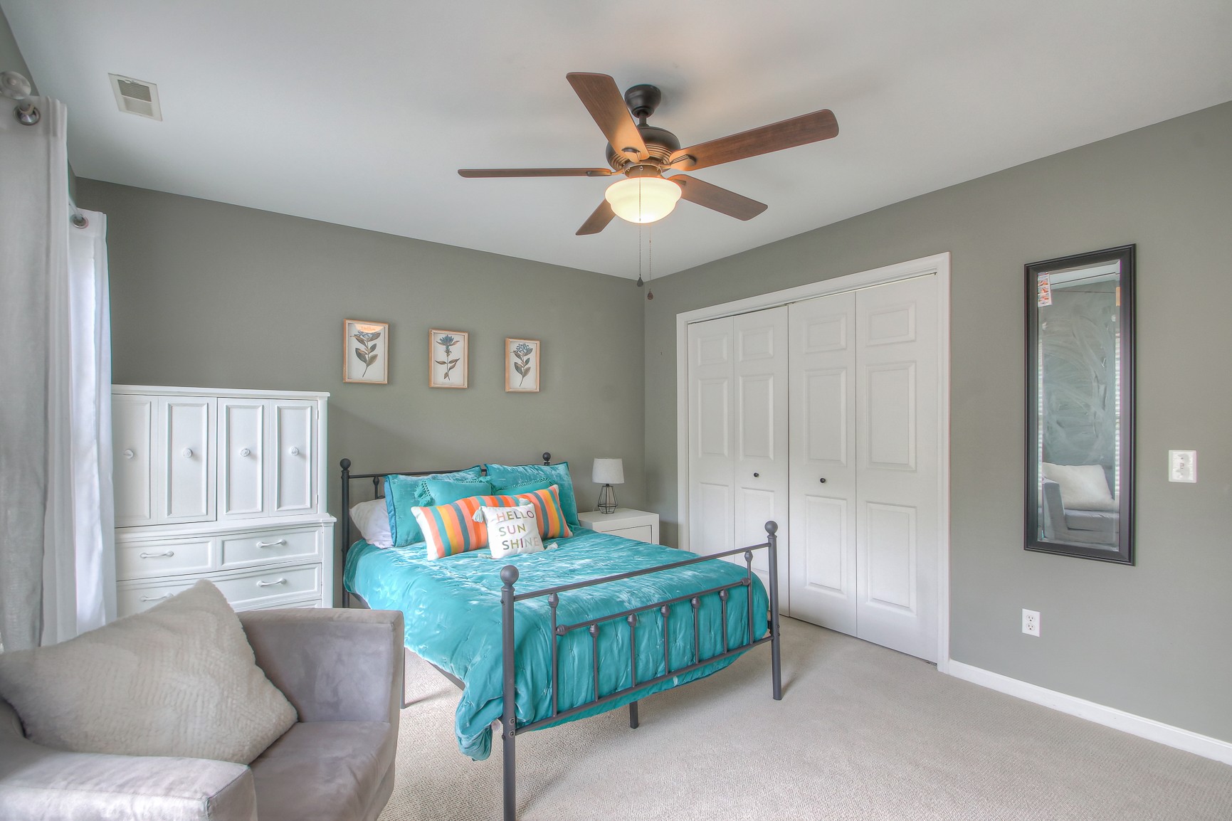 529 Crofton Park Lane Franklin, TN 37069 - Photo 38 of 59 a bedroom with a bed and a chandelier