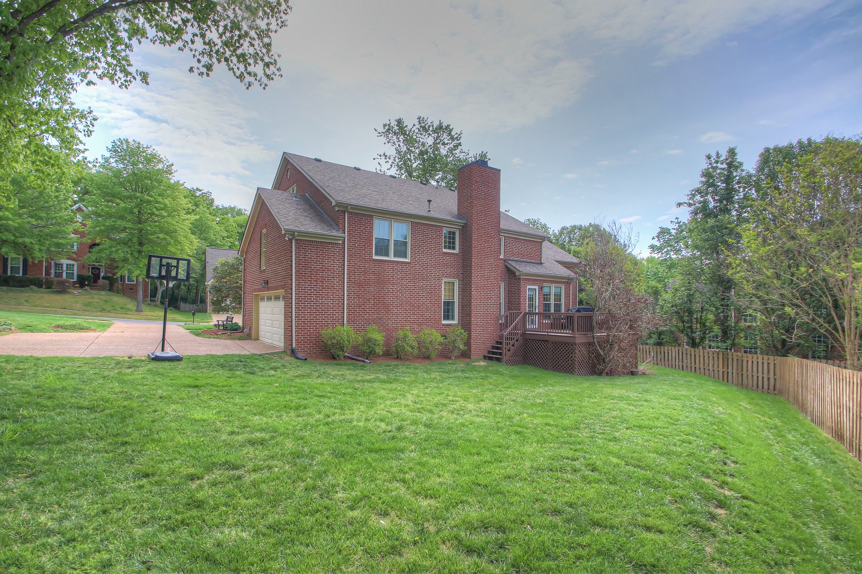 529 Crofton Park Lane Franklin, TN 37069 - Photo 54 of 59 a view of a house with a yard and a porch