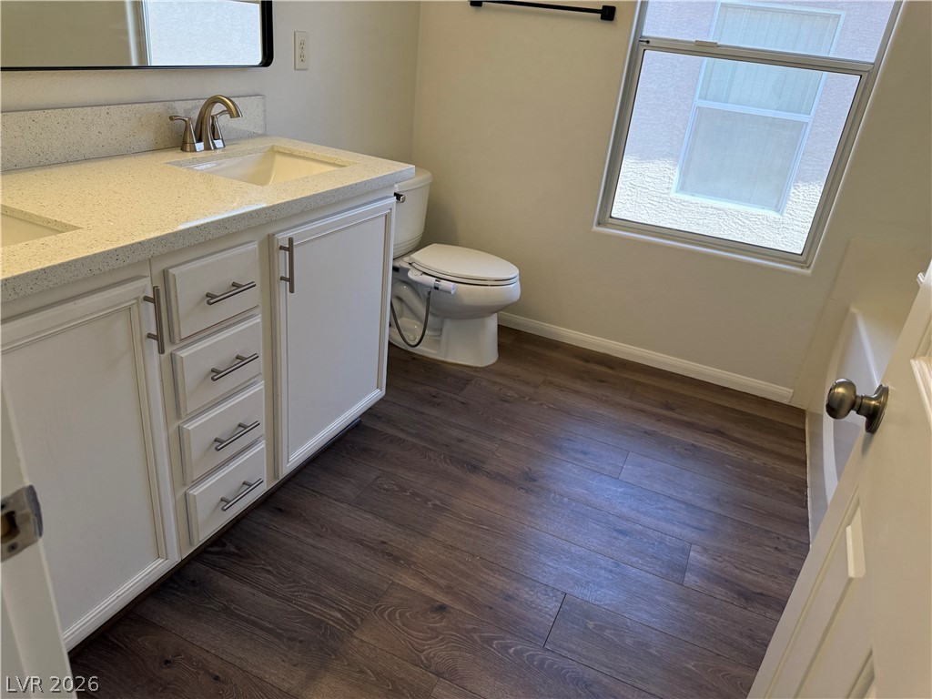 1141 Cathedral Ridge Street Henderson, NV 89052 - Photo 53 of 77 This bathroom features durable flooring and a vanity with ample storage.