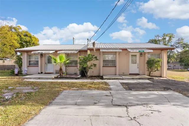 a view of a house with a patio