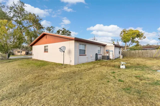 a bathroom with a sink mirror and vanity