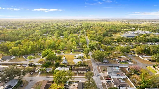 an aerial view of residential building with parking space