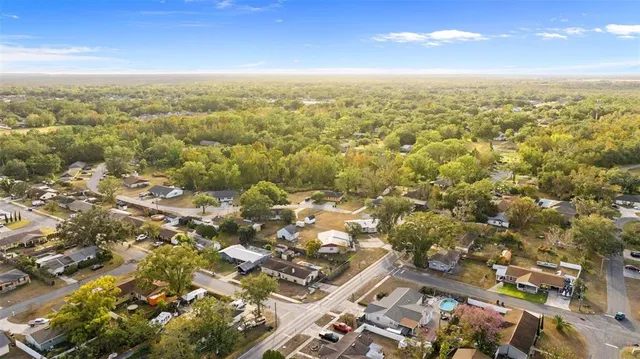 an aerial view of residential building with parking space