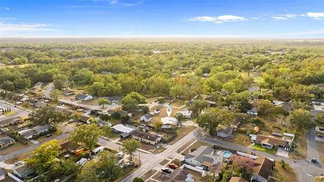 an aerial view of residential building with parking space