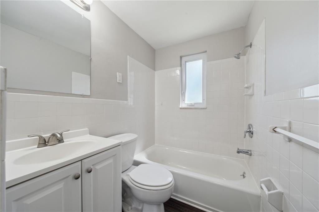 357 Collins Drive Pittsburgh, PA 15235 - Photo 8 of 23 a bathroom with a sink toilet and shower