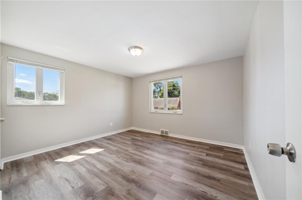 357 Collins Drive Pittsburgh, PA 15235 - Photo 9 of 23 a view of empty room with wooden floor