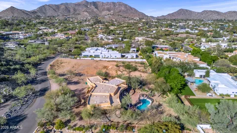 an aerial view of a house with outdoor space
