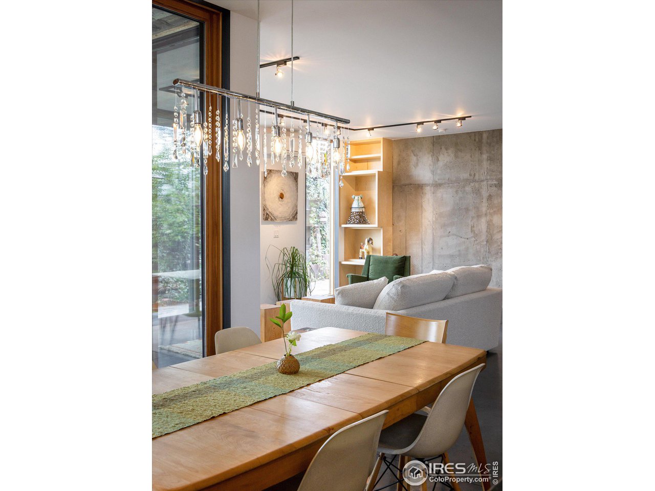 1740 Cedar Avenue Boulder, CO 80304 - Photo 12 of 40 a view of a dining room with furniture and a window