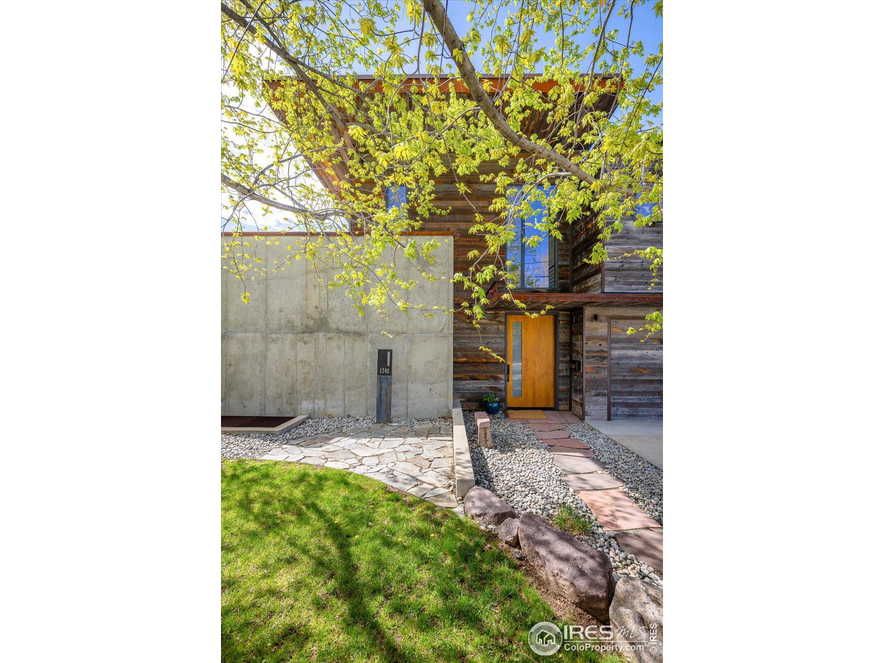 1740 Cedar Avenue Boulder, CO 80304 - Photo 2 of 40 a bathroom with a sink and a mirror