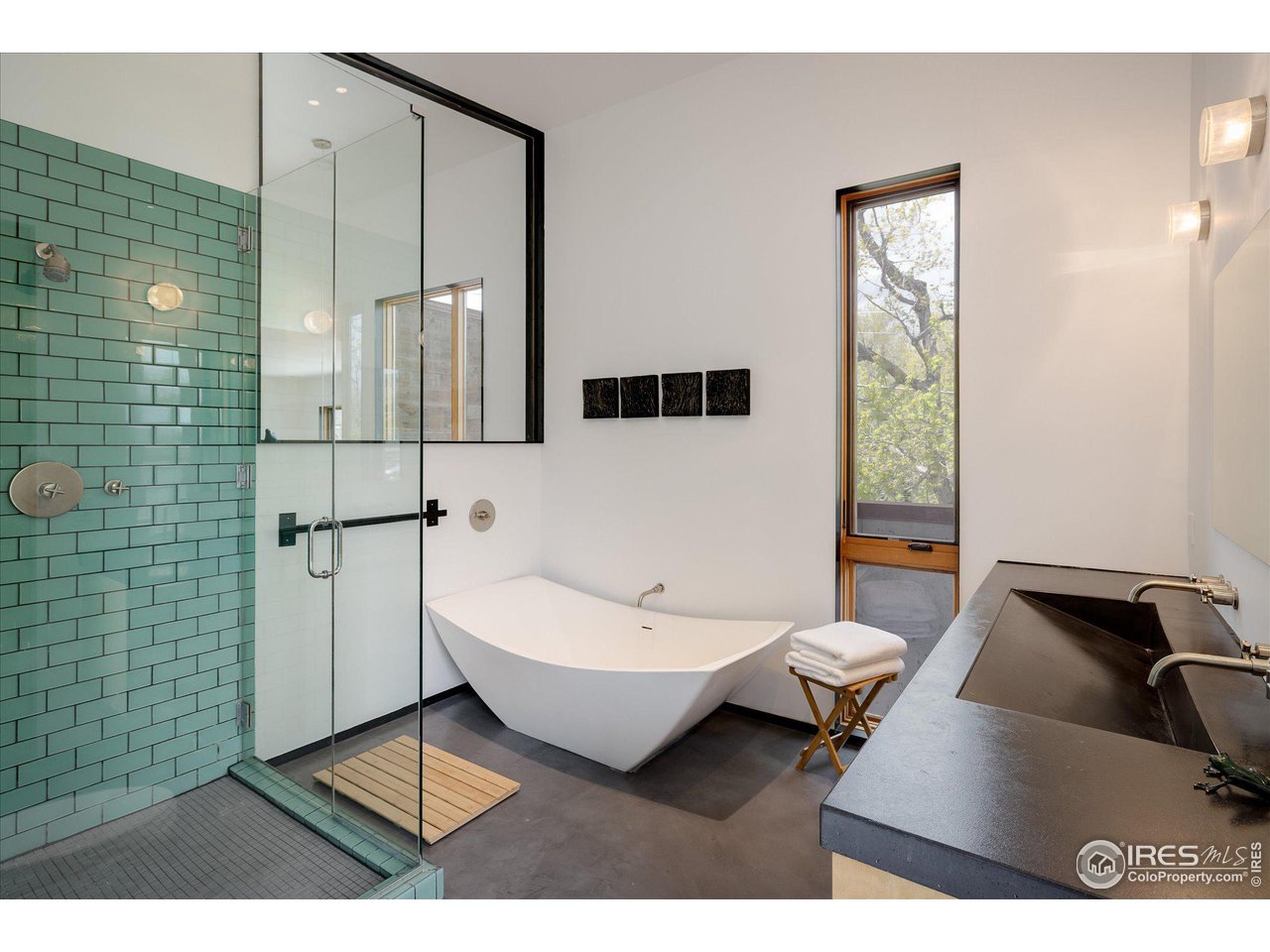 1740 Cedar Avenue Boulder, CO 80304 - Photo 23 of 40 a living room with a couch and a table