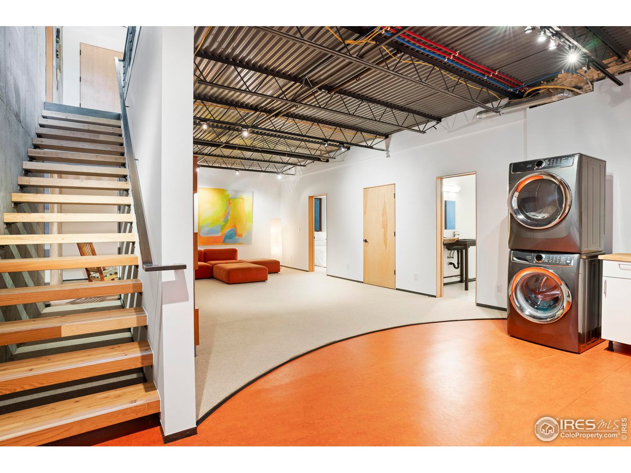1740 Cedar Avenue Boulder, CO 80304 - Photo 31 of 40 a view of a livingroom with furniture and staircase