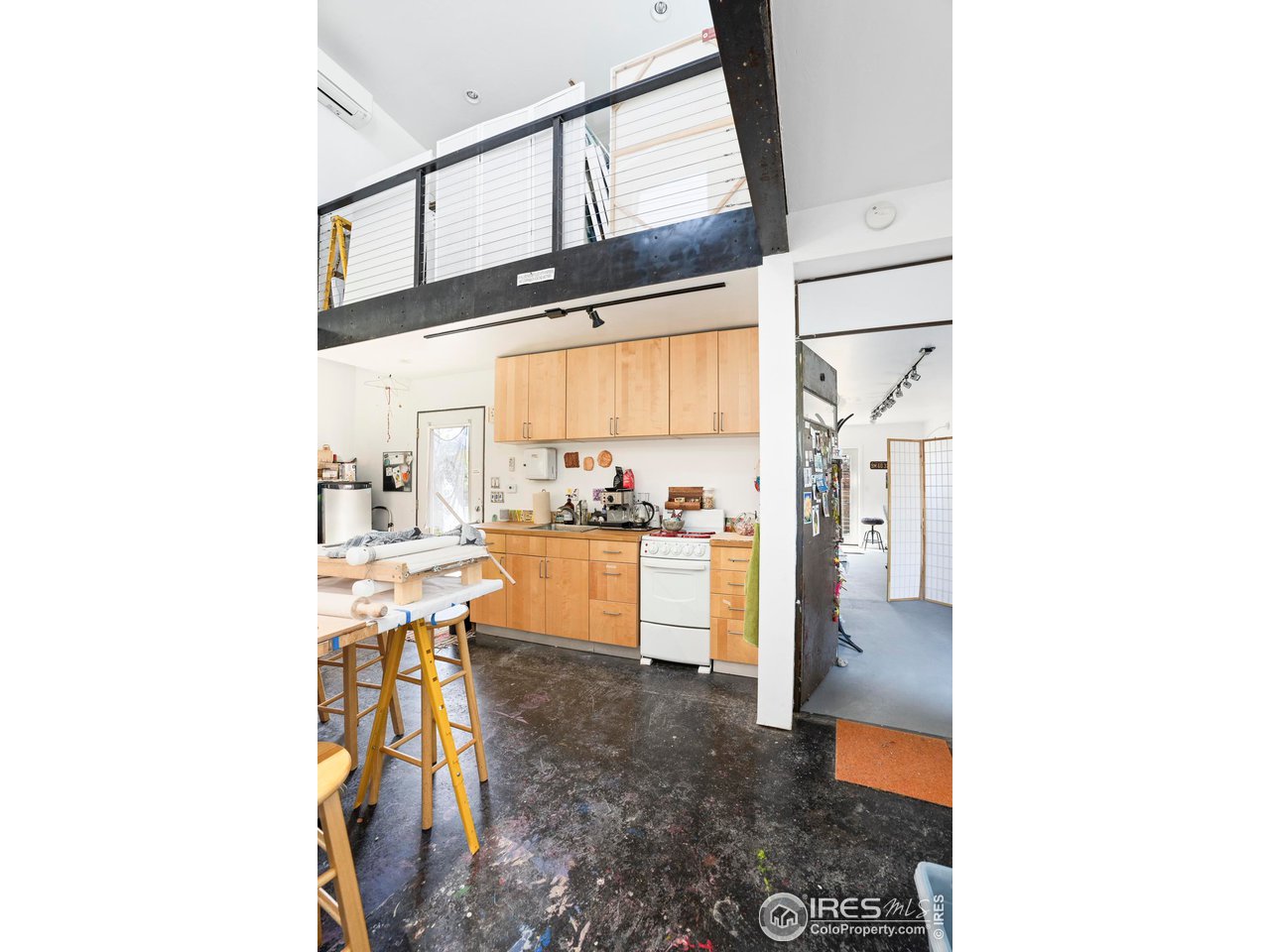 1740 Cedar Avenue Boulder, CO 80304 - Photo 38 of 40 a view of living room with kitchen island and furniture