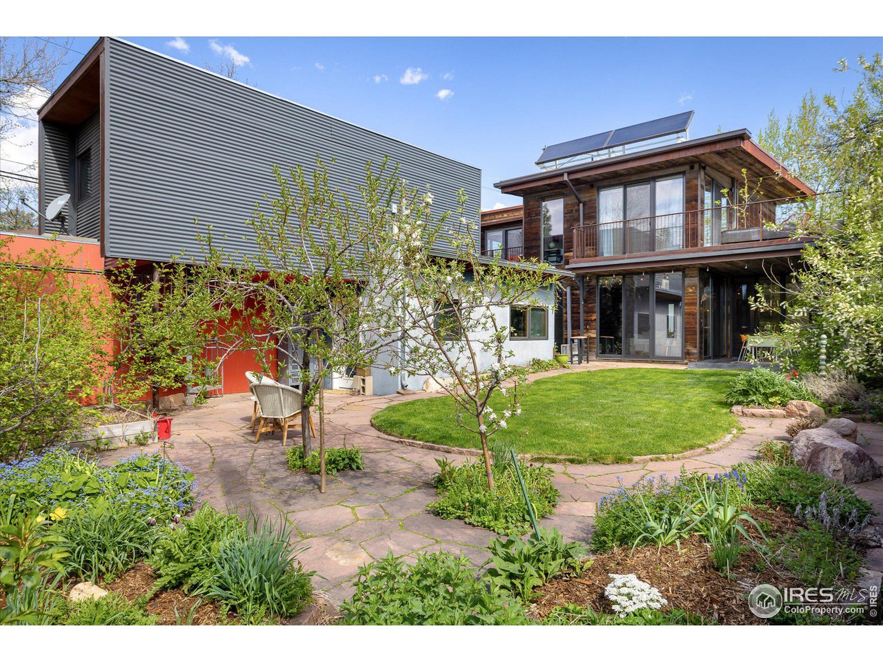 1740 Cedar Avenue Boulder, CO 80304 - Photo 40 of 40 a front view of a house with garden