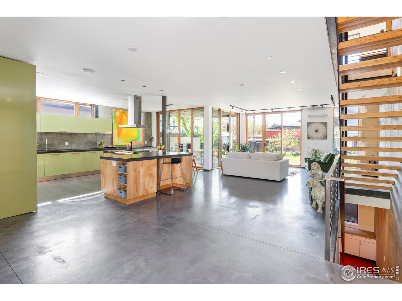 1740 Cedar Avenue Boulder, CO 80304 - Photo 4 of 40 a living room with furniture and a large window