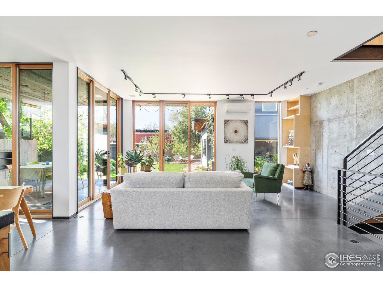 1740 Cedar Avenue Boulder, CO 80304 - Photo 6 of 40 a living room with furniture and a large window